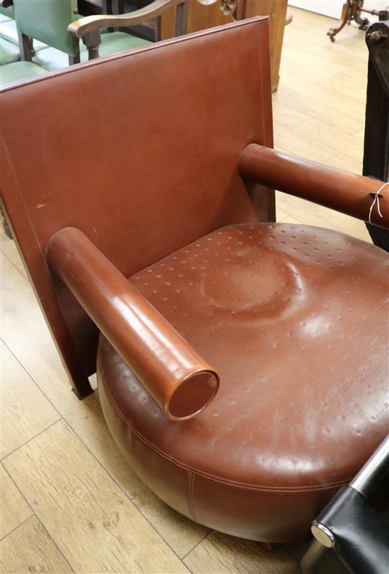 A leather 1950s chair, W.85cm